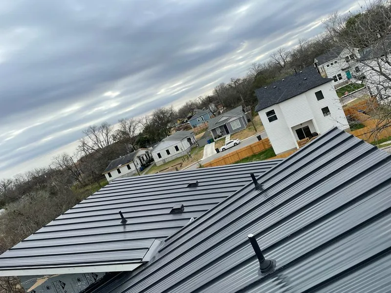 Standing seam metal roof panels with vents for Skylight Repair in Ewing